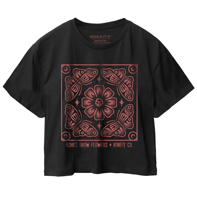 Front view of black women's crop t-shirt with 'Ashes Grow Flowers' graphic