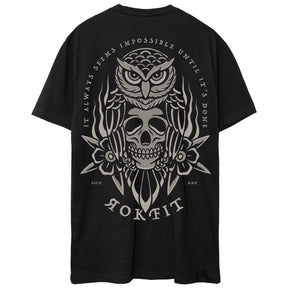 Back view of unisex black Active Tee with 'It Always Seems Impossible Until It's Done' graphic